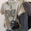sg-11134201-7rdy4-mbo0j0eeu7vaa0.webp Free Size Baggy Ruched Top with Distressed Butterfly Embroidery Casual Women s Tee