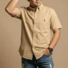sg-11134201-8262i-mky0t2gults32e.webp Free Size Men s Short Sleeve Logo Design Cotton Casual Shirt Kemeja Lelaki With Pocket Lengan Pendek Cotton Fabric